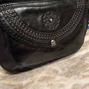 Patricia Nash black leather purse lined